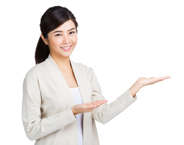 Woman showing something with two hand - Photo, Image