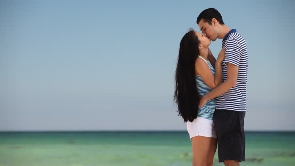 Young couple on the beach in summer day. - Footage, Video