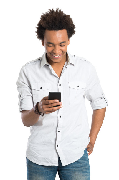 Young African Man With Cell Phone - Foto, immagini
