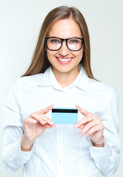 Business woman holding credit card - Foto, Imagen
