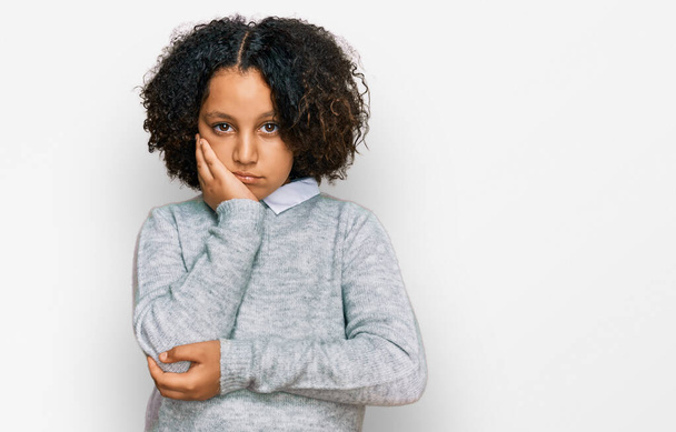 Young little girl with afro hair wearing casual clothes thinking looking tired and bored with depression problems with crossed arms.  - Foto, imagen
