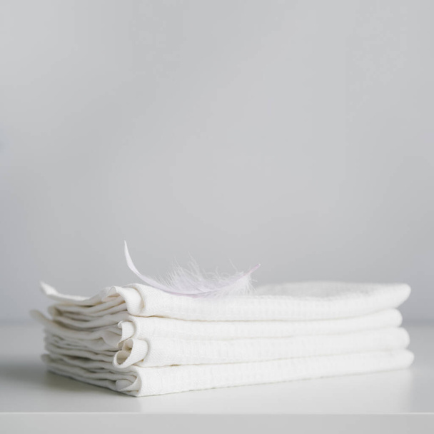 front view stacked white towels. Resolution and high quality beautiful photo - Photo, Image