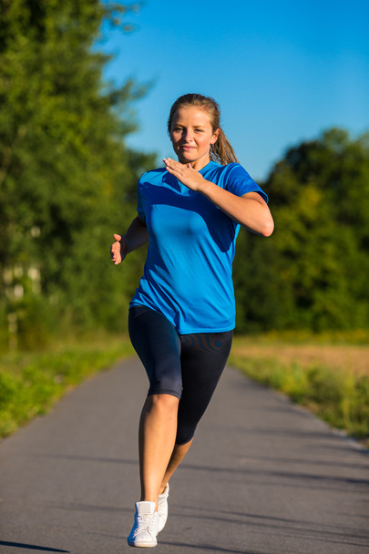Woman running - Zdjęcie, obraz