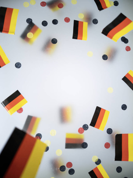German Unity Day. October 3. National flags on a foggy background. The concept of patriotism, memory, and freedom. High quality photo - Photo, Image
