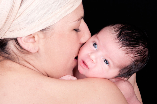 Mère avec nouveau-né
 - Photo, image