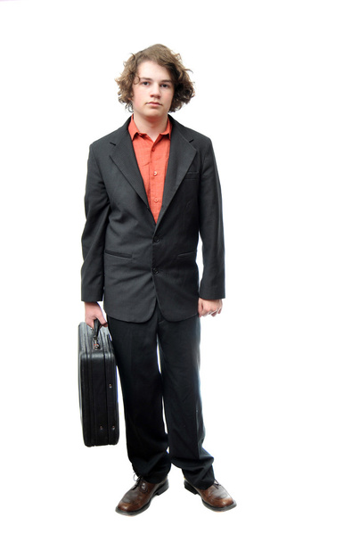 Young adult holding briefcase - Fotó, kép