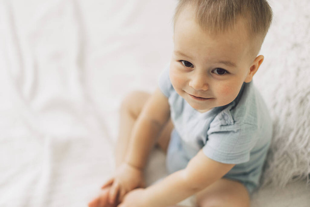 Happy little Boy. Portrait of a cute little boy in a bedroom. - Photo, image