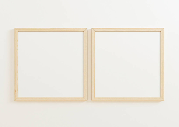 Doble 10x10 Cuadrado marco de madera maqueta en la pared blanca. Dos carteles vacíos sobre fondo blanco. Renderizado 3D - Foto, imagen