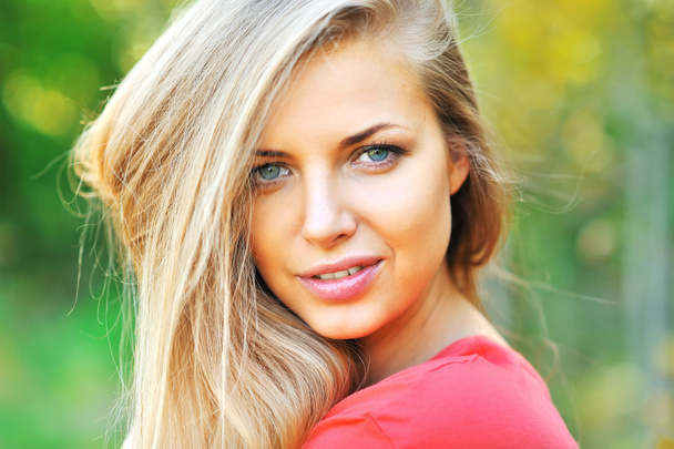 Beautiful young woman face closeup - Photo, Image
