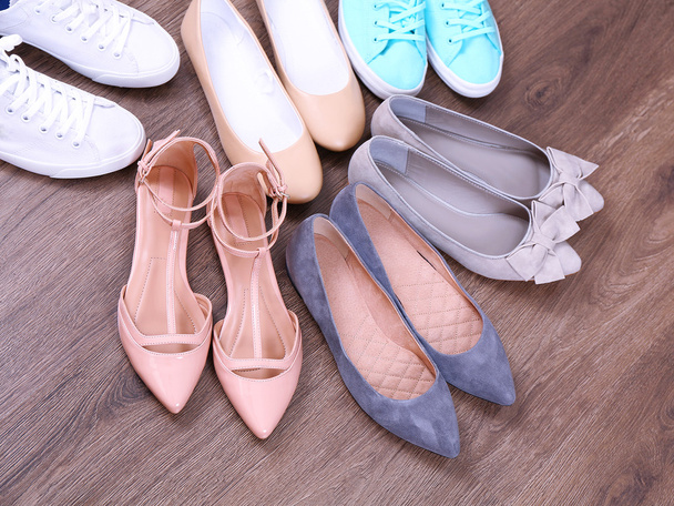 Different shoes on floor - Foto, Imagem