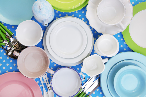 Different tableware on tablecloth - Foto, imagen