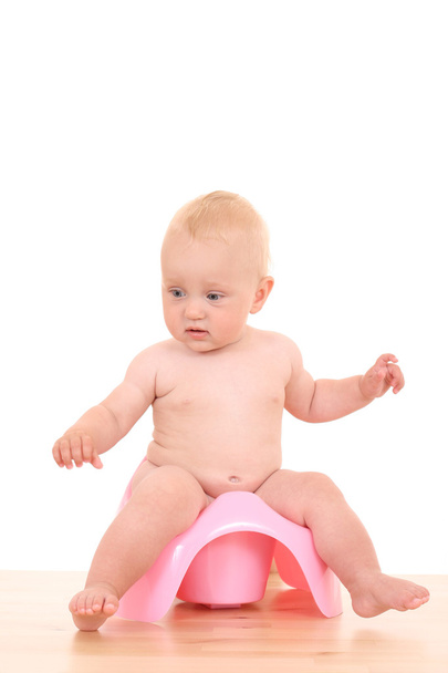 Baby on potty - Фото, изображение