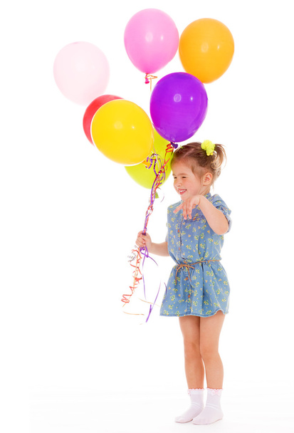 Charming girl with balloons. - Fotoğraf, Görsel