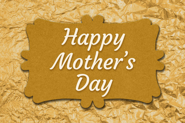 Happy Mothers Day message on gold glitter greeting card with golden sparkle - Fotó, kép
