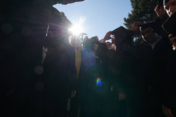 Group of diverse international graduating students celebrating - Photo, Image