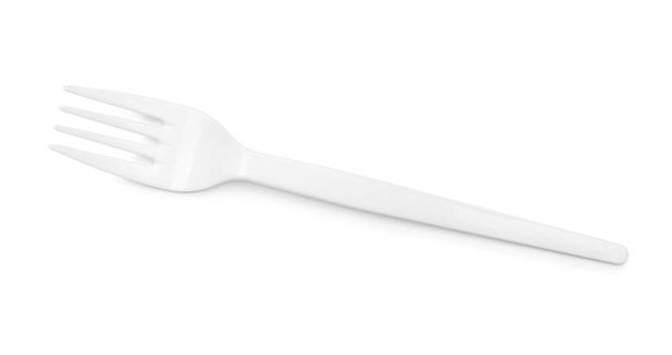 Fourchette en plastique sur fond blanc - Photo, image