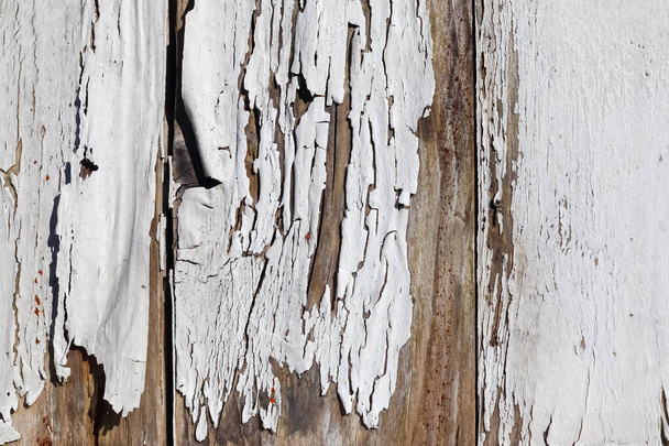 A closeup shot of a chipped wooden surface - Fotoğraf, Görsel