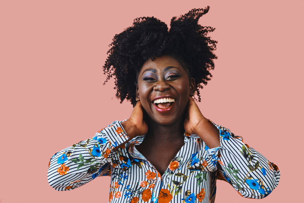 beautiful young black woman laughing looking at camera - Photo, Image