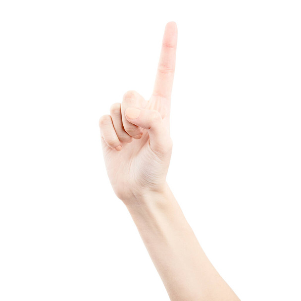 Vrouwelijke hand geïsoleerd op witte achtergrond. De hand van een blanke vrouw met symbolen en gebaren. Het gebaar roept om orde. Richting van het gebaar - Foto, afbeelding