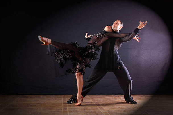 Dancers in ballroom isolated on black background - Valokuva, kuva