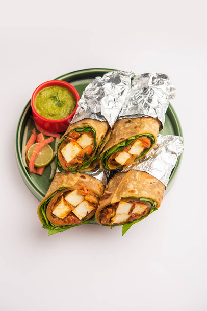 Cottage Cheese Paneer kathi roll or wrap also known as kolkata style spring rolls, vegetarians Indian food - Photo, Image