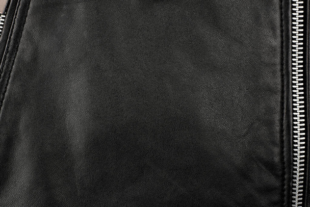 giacca punk in pelle nera testurizzata. giacca da motociclista. Tessuto in pelle texture - Foto, immagini