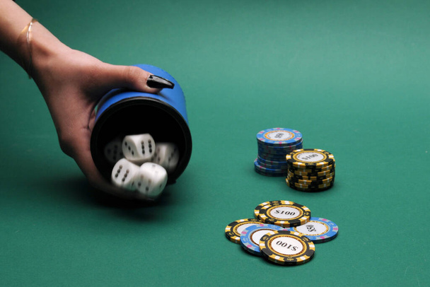 Throwing the dice on the green table, gambling ... - Foto, Bild