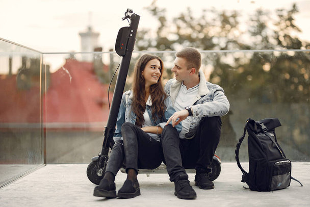 Beautiful couple spend time in a autumn city - Photo, image
