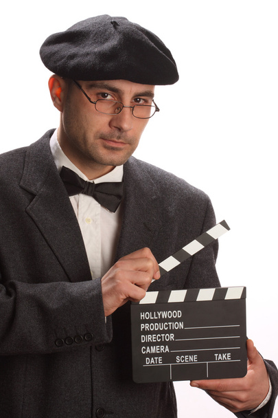 Homem à moda antiga segurando filme clapboard
 - Foto, Imagem