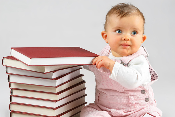 Small baby and books - Φωτογραφία, εικόνα