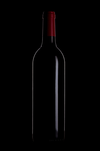 Wine bottle outline on black background - Photo, Image