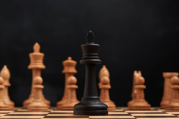 Business strategy concept with chess figures - Foto, afbeelding
