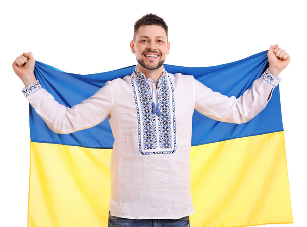 Happy man with flag of Ukraine on white background - Zdjęcie, obraz