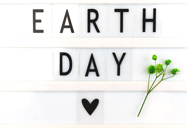 Earth Day Inschrift Hintergrund mit Textnachricht  - Foto, Bild