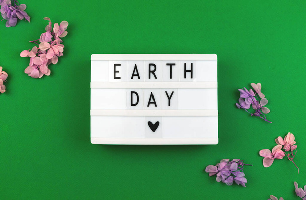 Earth Day creative background, with lightbox and lettering - Photo, Image