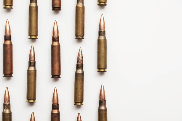A group of bullet ammunition shells on a white background - Фото, зображення