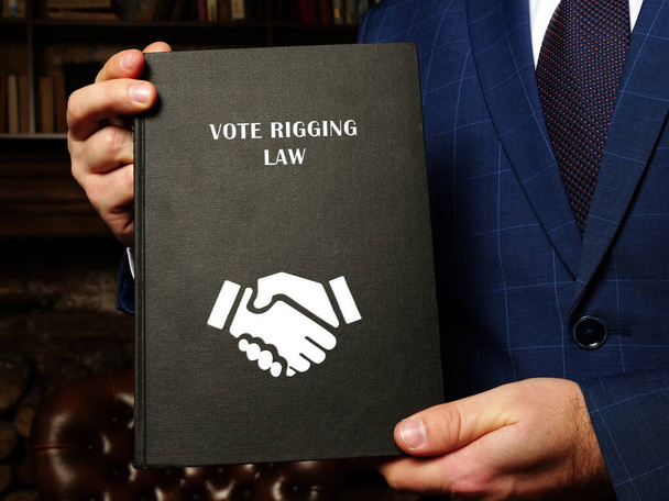 VOTE RIGGGING LAW titre du livre. La fraude électorale et électorale peut entraîner de graves peines, y compris des peines de prison - Photo, image
