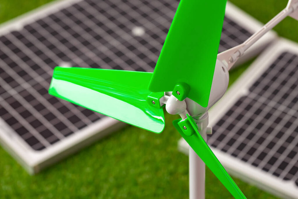 Models of windmill and solar panel, alternative energy sources - Foto, Bild