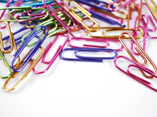 Paper clip, metal shiny colorful isolated on white background - Photo, Image