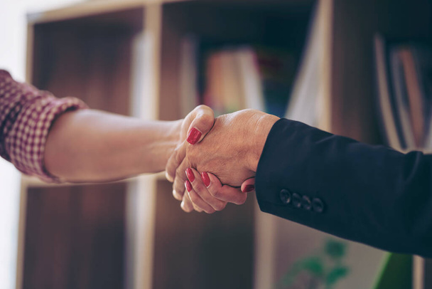 Handshake partnership deal meeting. Successful businessmen handshaking after good deal. business colleagues greeting each other with a shaking hand. Worker Hand Assemble Corporate seminar Teamwork. - Фото, изображение