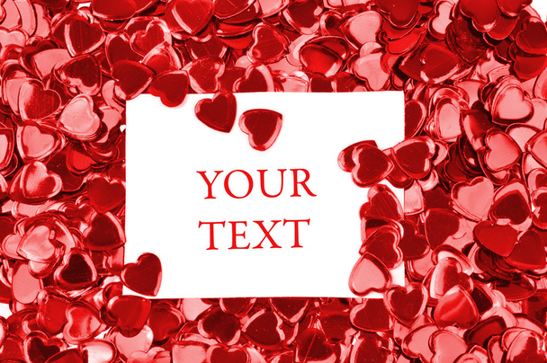 Card with space for your text on a red hearts background - Photo, Image