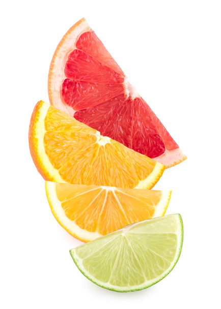 カラフルな柑橘類のスライス - 写真・画像