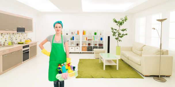 νεαρή λευκή γυναίκα στέκεται σε καθαρό σπίτι εκμετάλλευση προϊόντα καθαρισμού - Φωτογραφία, εικόνα