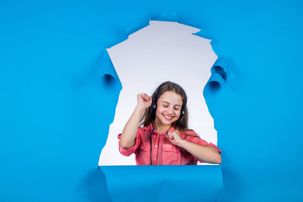 happy teen girl wear headphones and listen music, volume - Fotó, kép