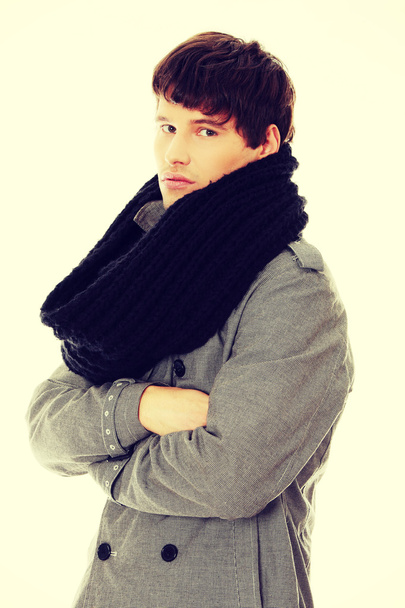 Man in scarf and coat. - Фото, зображення