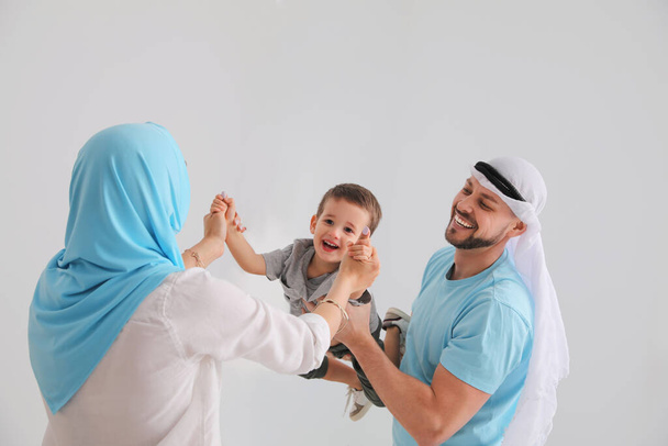 Happy Muslim family spending time together at home - Fotó, kép
