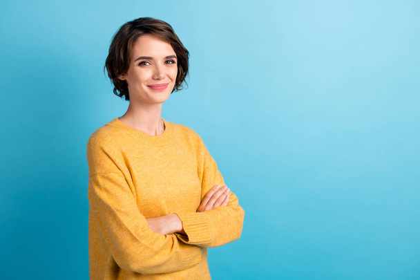 Photo portrait of pretty girl with bob hairstyle folded hands smiling isolated on bright blue color background with empty space - Foto, immagini