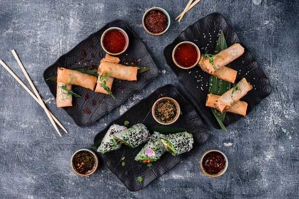 Crispy Chinese Traditional Spring rolls food on set, spring rolls set with copy space background top view, flat lay - Foto, Imagem