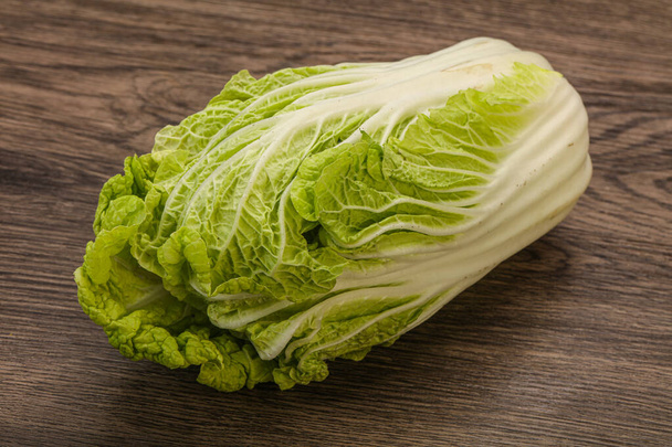 Vegan cuisine - Green fresh tasty Chinese cabbage - Fotografie, Obrázek