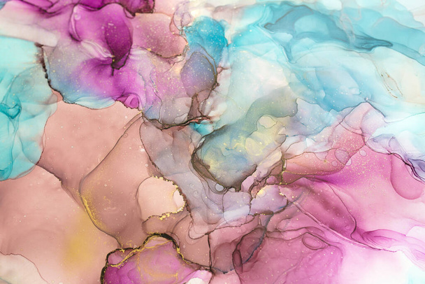 Currents of translucent hues, snaking gold swirls, and foamy sprays of color shape the marble of these free-flowing textures. The marbling techniques, alcohol ink, modern abstract painting  - Photo, Image